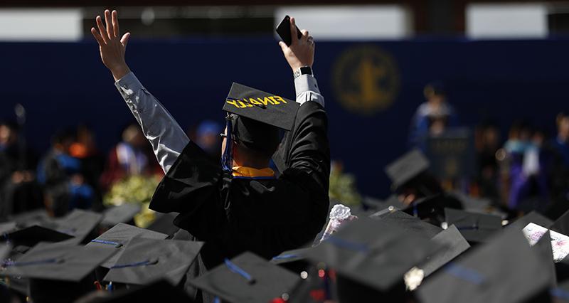 Students celebrating at graduation