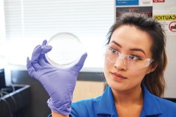 Student with agar plate